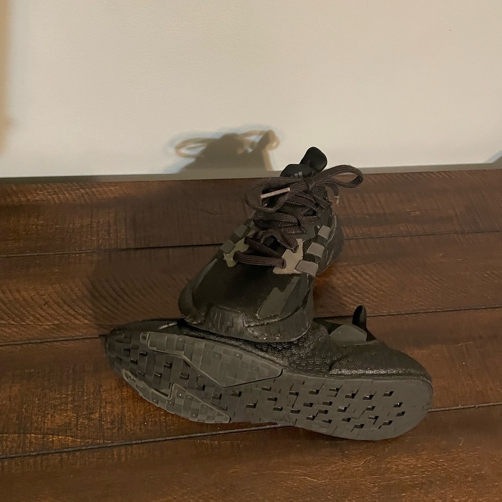 Youth size 4 black Adidas.
